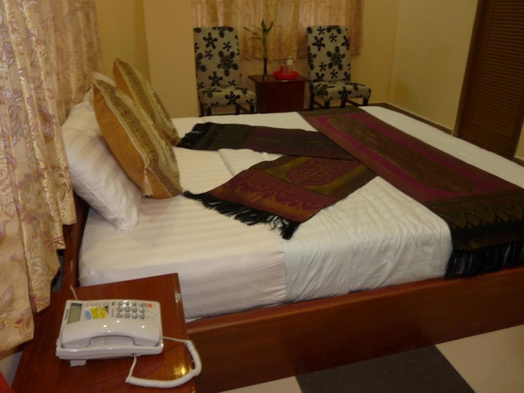 Hi Land Hotel Phnom Penh Quarto foto