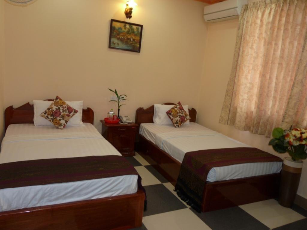 Hi Land Hotel Phnom Penh Quarto foto